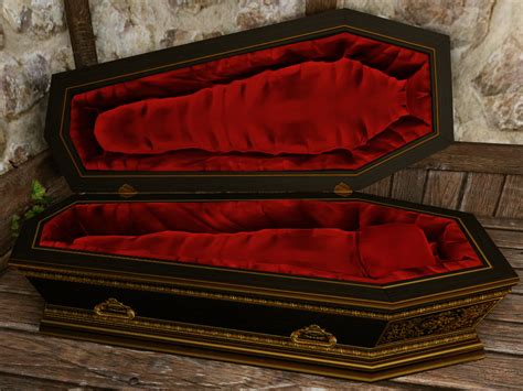 Gilt Blackwood Coffin
