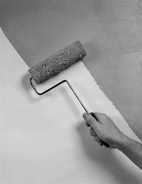 1950s Hand Using Paint Roller On Wall Photograph By Vintage Images Pixels