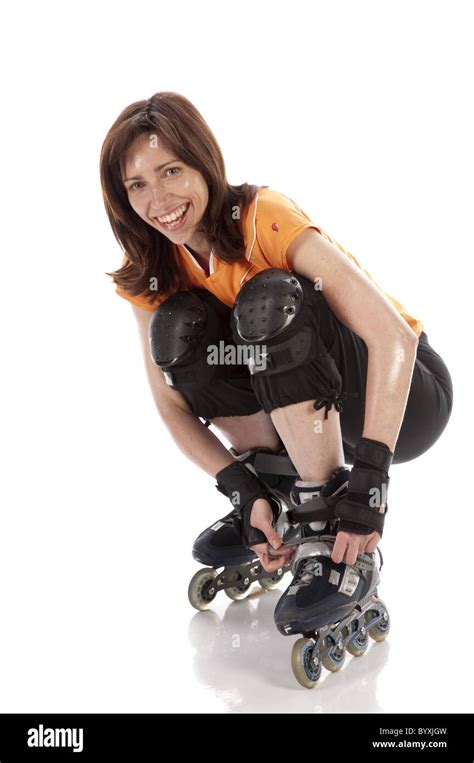 Woman Inline Skating Stock Photo Alamy