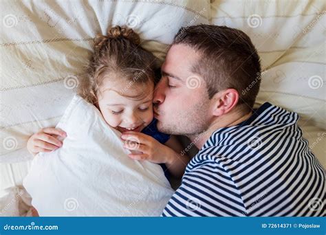 Father Having Fun With His Cute Little Daughter Stock Image Image Of Lying Bedroom 72614371