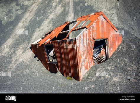 Buried Corrugated Metal Hut At Honister Slate Mine In The Lake District