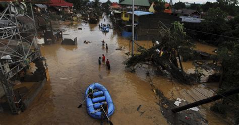 Flash Floods Kill At Least 450 In Philippines Cbs News