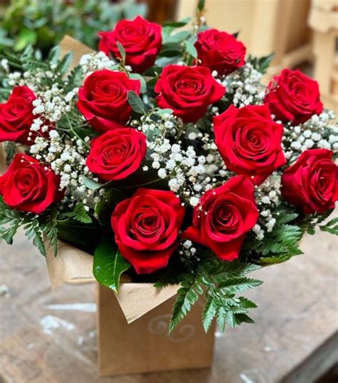 12 Stunning Large Headed Long Stem Red Roses With Gypsophila Buy