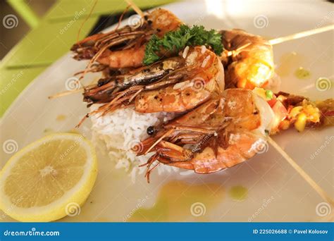 Fried King Prawns With Rice And Lemon Stock Photo Image Of Seafood