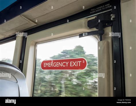 Bus emergency exit door with sign, Nottinghamshire, England, UK Stock Photo - Alamy