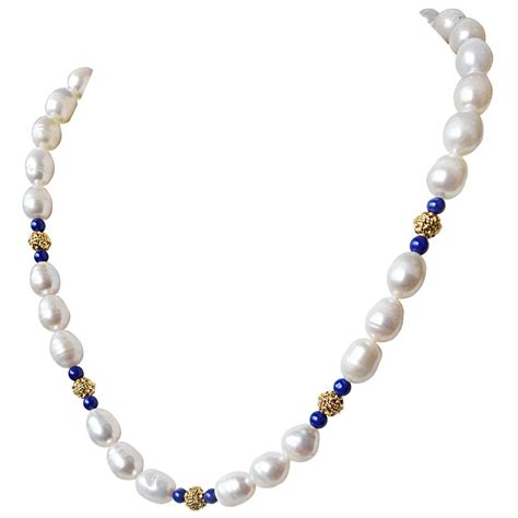 Single Line Blue Lapiz Big Elongated Pearl And Gold Plated Ball