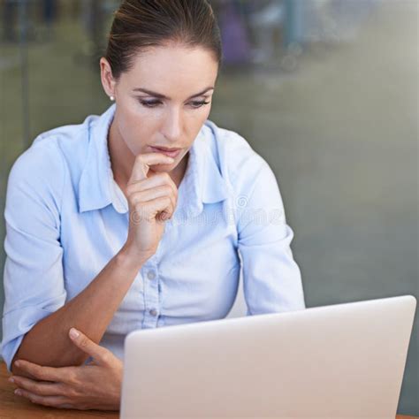 Business Serious Woman And Thinking Face At Laptop For Research Ideas