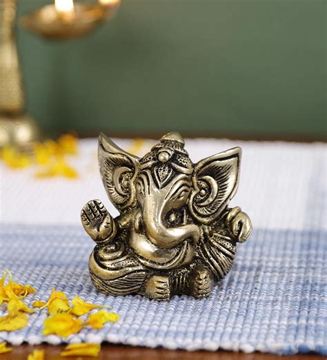 Buy Ganesh 2 Hands Golden Brass Religious Idol By Imli Street At 44