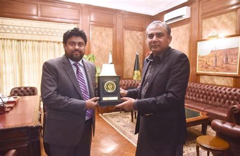 Governor Sindh Kamran Tessori Presenting Shield To Caretaker Chief Minister Punjab Mohsin Naqvi