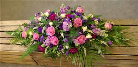 Casket Spray Pink And Purple Margaret Raymond Florist Interiors