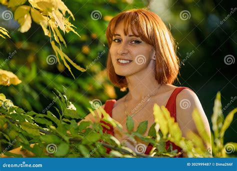 Close Up Portrait Of Smiling Redhead Outdoors Autumn S Warm Embrace