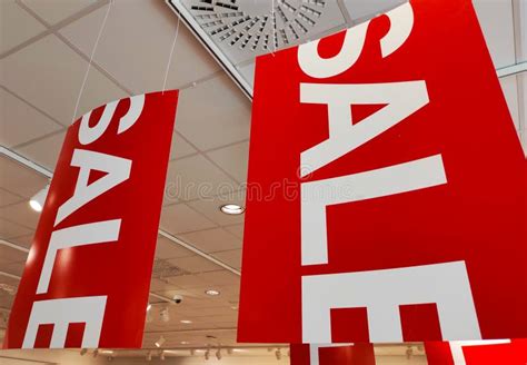 Sale Signs in a Clothing Store Stock Image - Image of consumerism ...