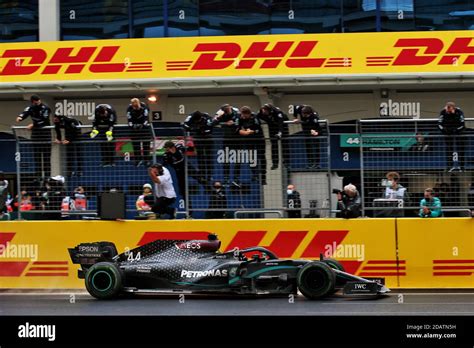 Lewis Hamilton Gbr Mercedes Amg F W Crosses The Line Watched By