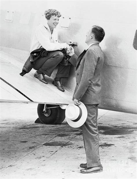 Amelia Earhart And Husband George by Bettmann