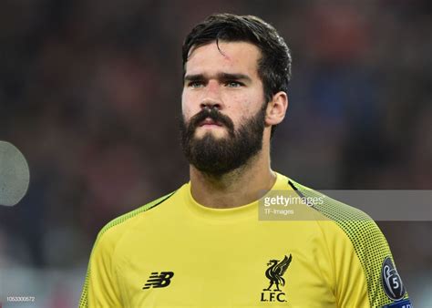 Goalkeeper Alisson Becker of Liverpool looks on prior the UEFA ...