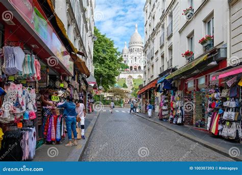 Souvenir Shops In Montmartre With The Sacre Coeur Basilica In The