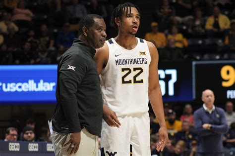 wvu moves   longtime coach larry harrison blue gold sports