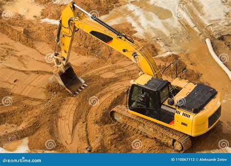 Working Excavator Tractor Digging a Trench. Stock Photo - Image of ...