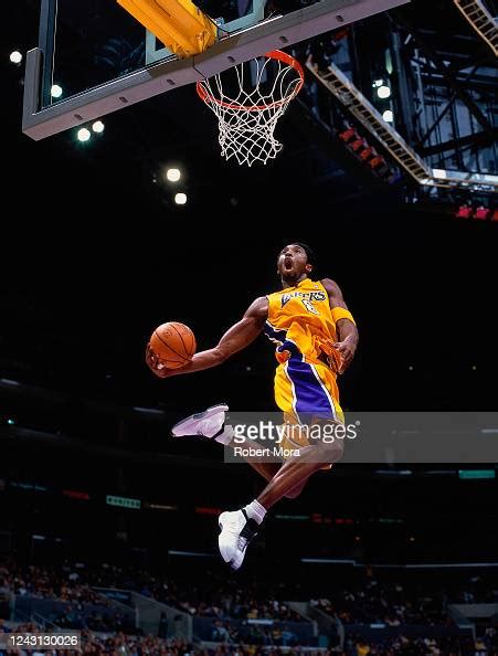 Kobe Bryant of the Los Angeles Lakers goes up for a dunk against the ...