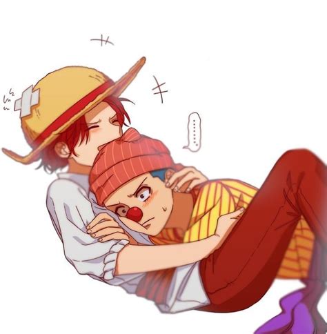 Two People Are Hugging And One Is Wearing A Hat