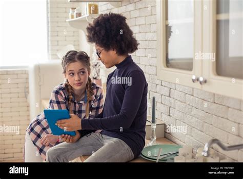 Beautiful Blonde Girl Staring At Her Classmate Stock Photo Alamy