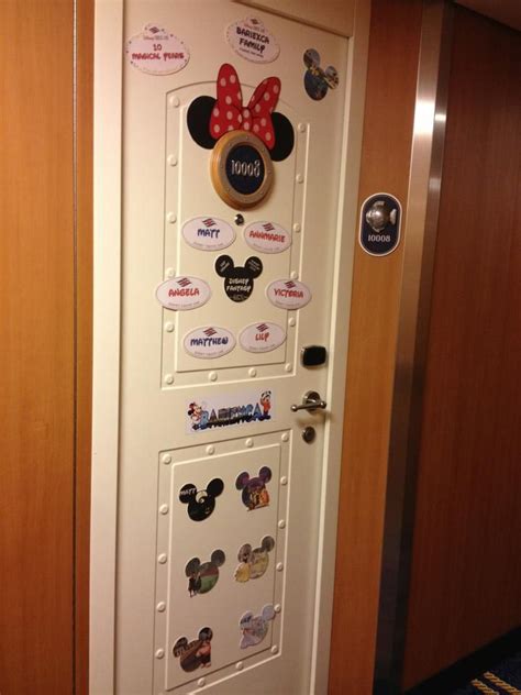 The Door To Mickey Mouses Room Is Decorated With Stickers And Magnets