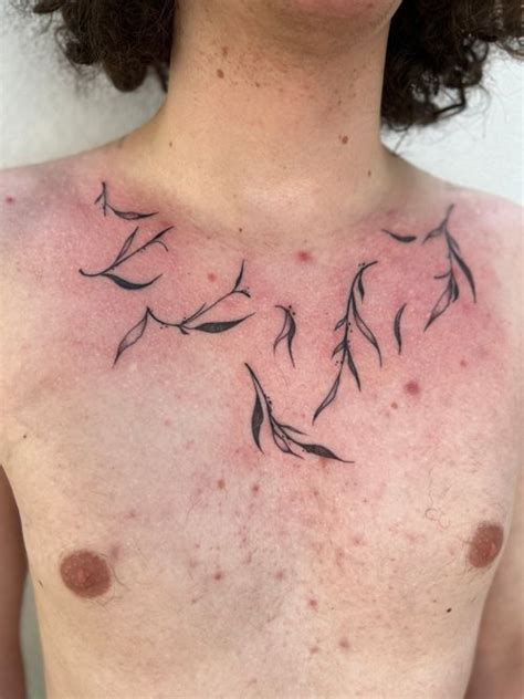 Blackwork Leaf Chest Tattoo • Tattoodo