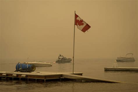 Canadian officials ease wildfire evacuation orders - The Garden Island