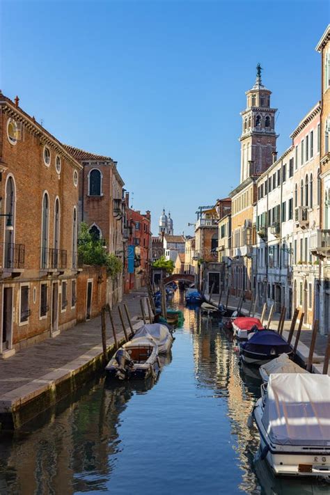 Venice, boats and canals stock image. Image of travel - 133580595