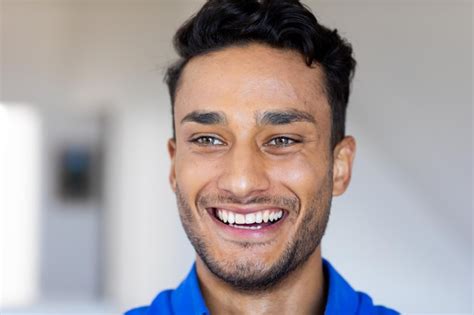 Premium Photo Close Up Of Happy Biracial Man Smiling And Looking Away