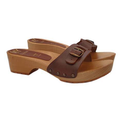 Traditional swedish clogs in real wood with bown leather upper and buckle