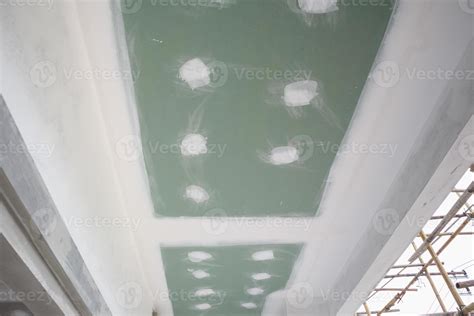 ceiling gypsum board installation at construction site 11181692 Stock ...