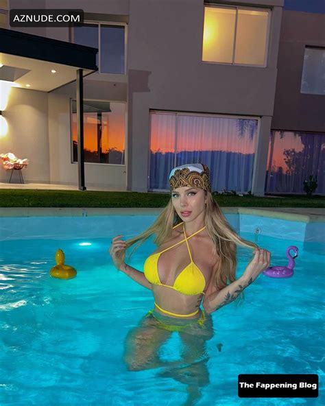 Romina Malaspina Sexy Looks Sensual Posing In A Hot Yellow Bikini In The Pool AZNude
