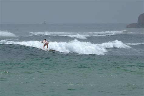 Surfing The Waves Of Koggala Beach In Sri Lanka Editorial Photo Image