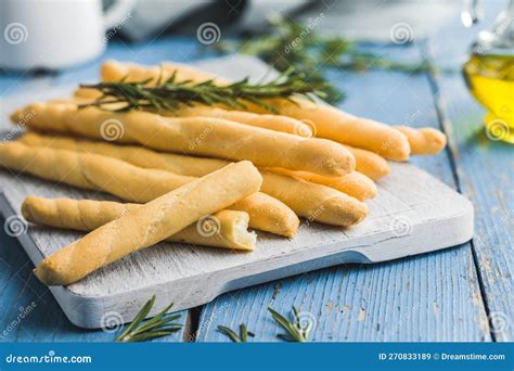 Italian Grissini Bread Sticks On Blue Table Stock Image Image Of