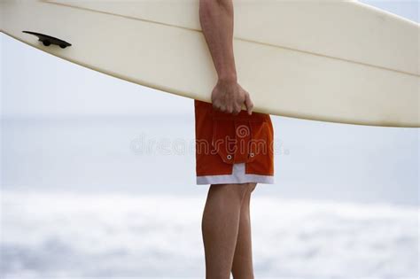 Shirtless Man Carrying Surfboard Over Head Stock Image Image Of