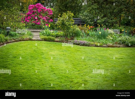 beautifully landscaped garden  lawn stock photo alamy