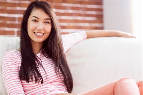 Premium Photo Asian Woman Relaxing On Couch