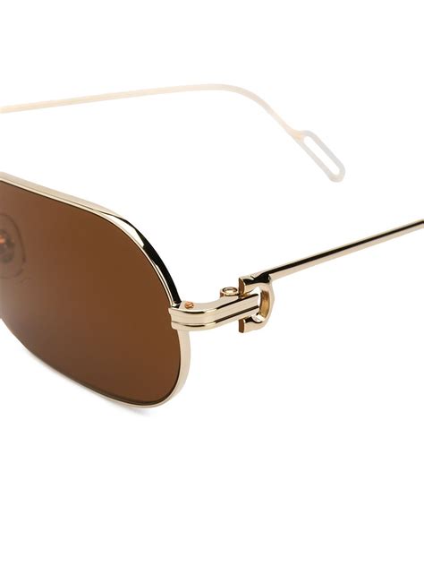 Cartier Première De Sunglasses In Gold Modesens