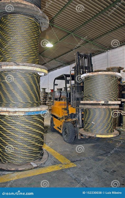 Large cable reels stocked stock photo. Image of detail - 152230038