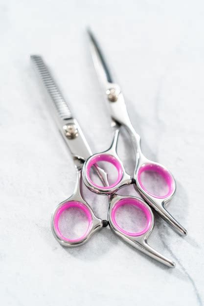 Premium Photo | Hair cutting scissors