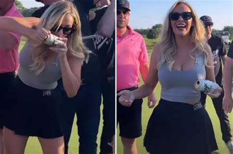 Paige Spiranac Puts On Very Busty Display In Low Cut Grey Top As She Slams A Beer On The Golf