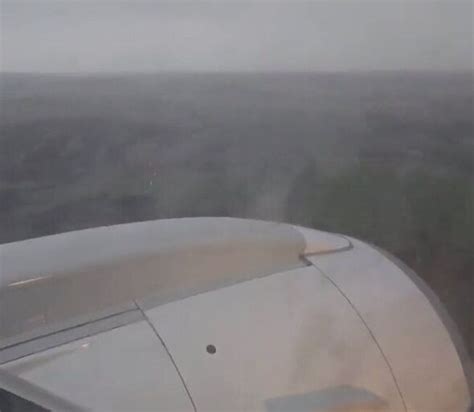 Terrifying Storm Babet video shows moment plane violently rocks as it ...