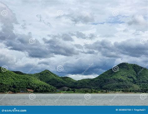 The Landscape Of The Mountain With The Reservoir On Clouds On The Blue