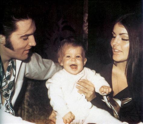 Elvis Presley With His Wife Priscilla And Lisa Marie A Photo On