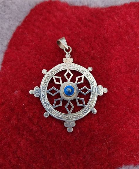 Dharma Chakra pendant- Tibetan Lucky Charm Buddhist Gift