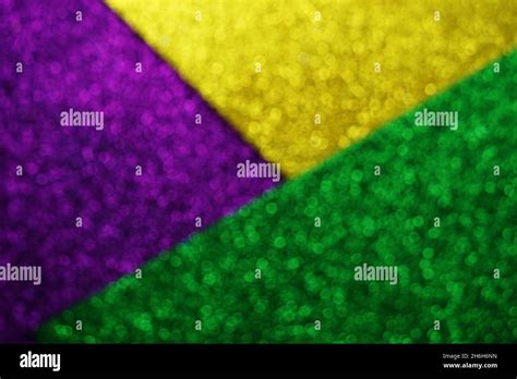 Mardi Gras with Green Purple and gold Light bokeh Background Stock Photo - Alamy