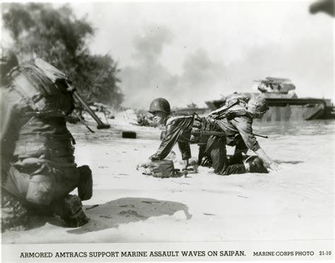 Us Marines Crawling On A Beach During An Invasion Saipan The