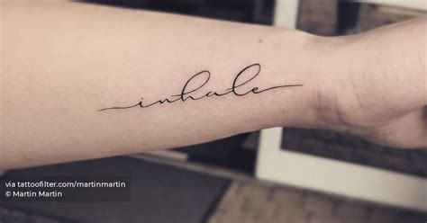 Inhale Lettering Tattoo On The Wrist