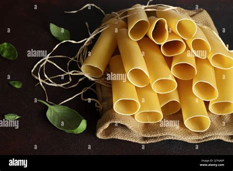 Cannelloni Pasta Tubes Isolated On Dark Background Italian Food Stock